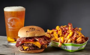 A BurgerFi meal with fries and beverages.
